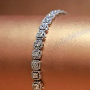 18ct White Gold Diamond Bracelet with Radiant Cut Diamonds and Round Brilliant Halo setting