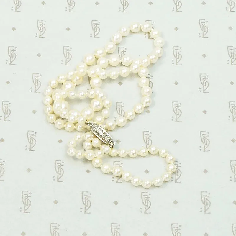 Delightful Diamond Barrel Clasp on Lovely Pearls