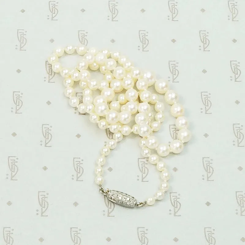 Delightful Diamond Barrel Clasp on Lovely Pearls