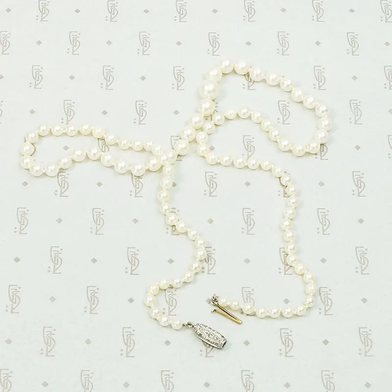 Delightful Diamond Barrel Clasp on Lovely Pearls