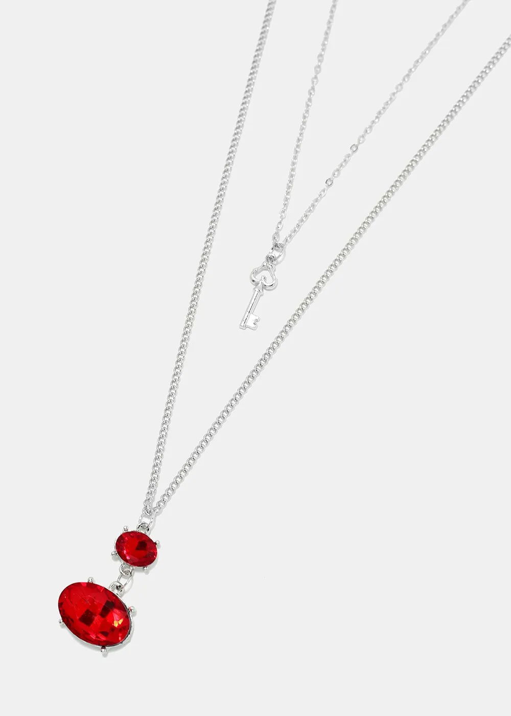 Layered gemstone and key pendant necklace