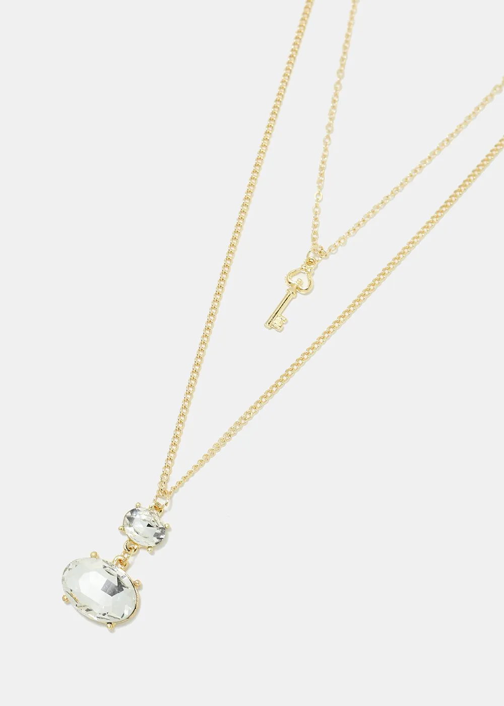 Layered gemstone and key pendant necklace