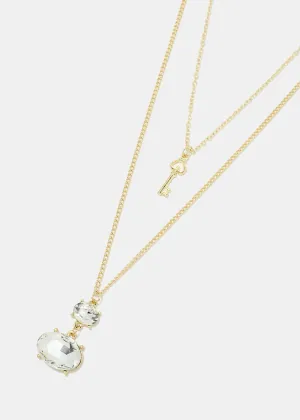 Layered gemstone and key pendant necklace
