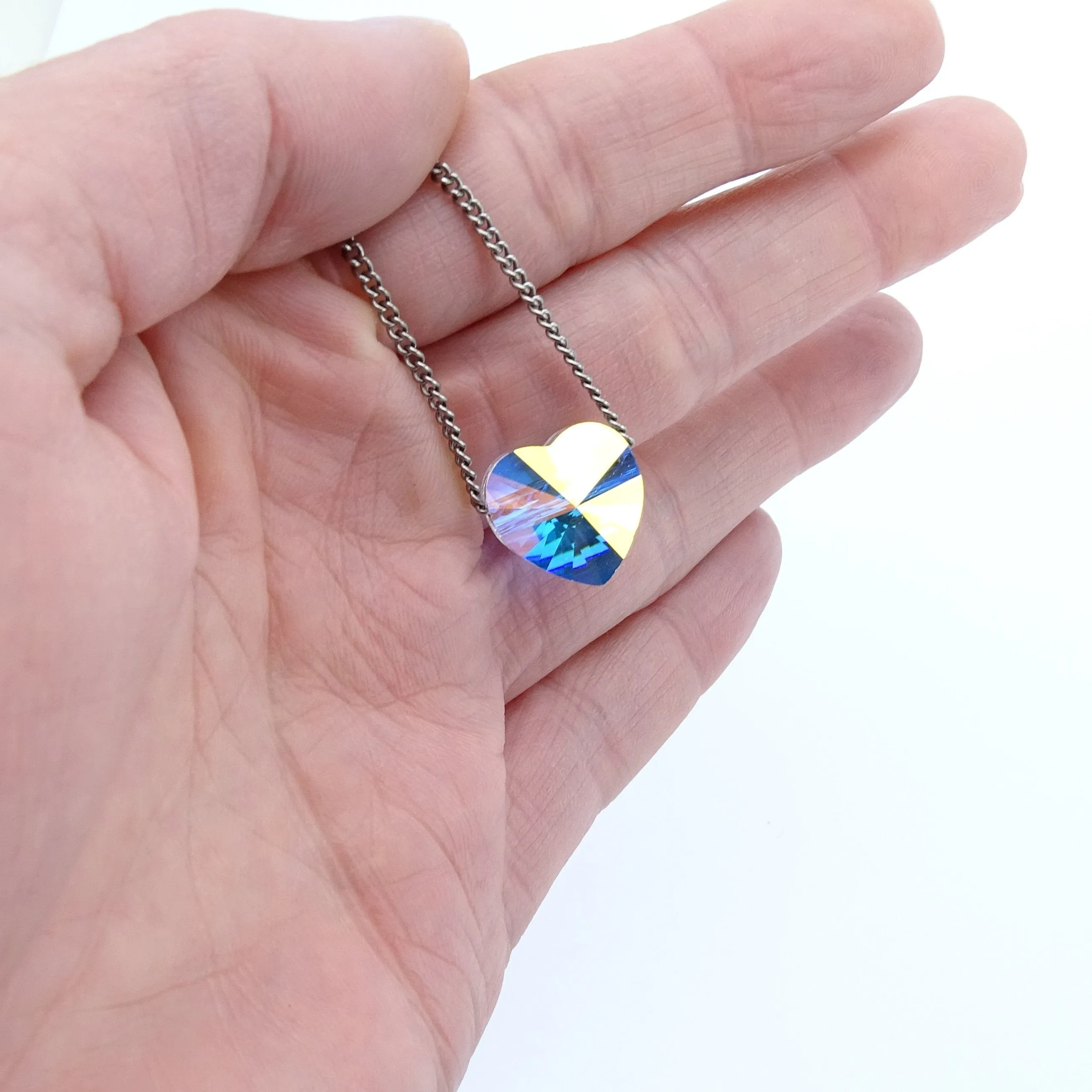Titanium Necklace with Floating Aurora Borealis Crystal Heart Bead
